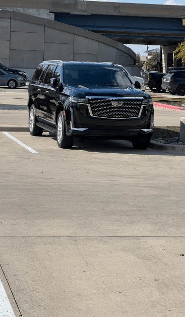 Black Limousine SUV in the Open Parking Space