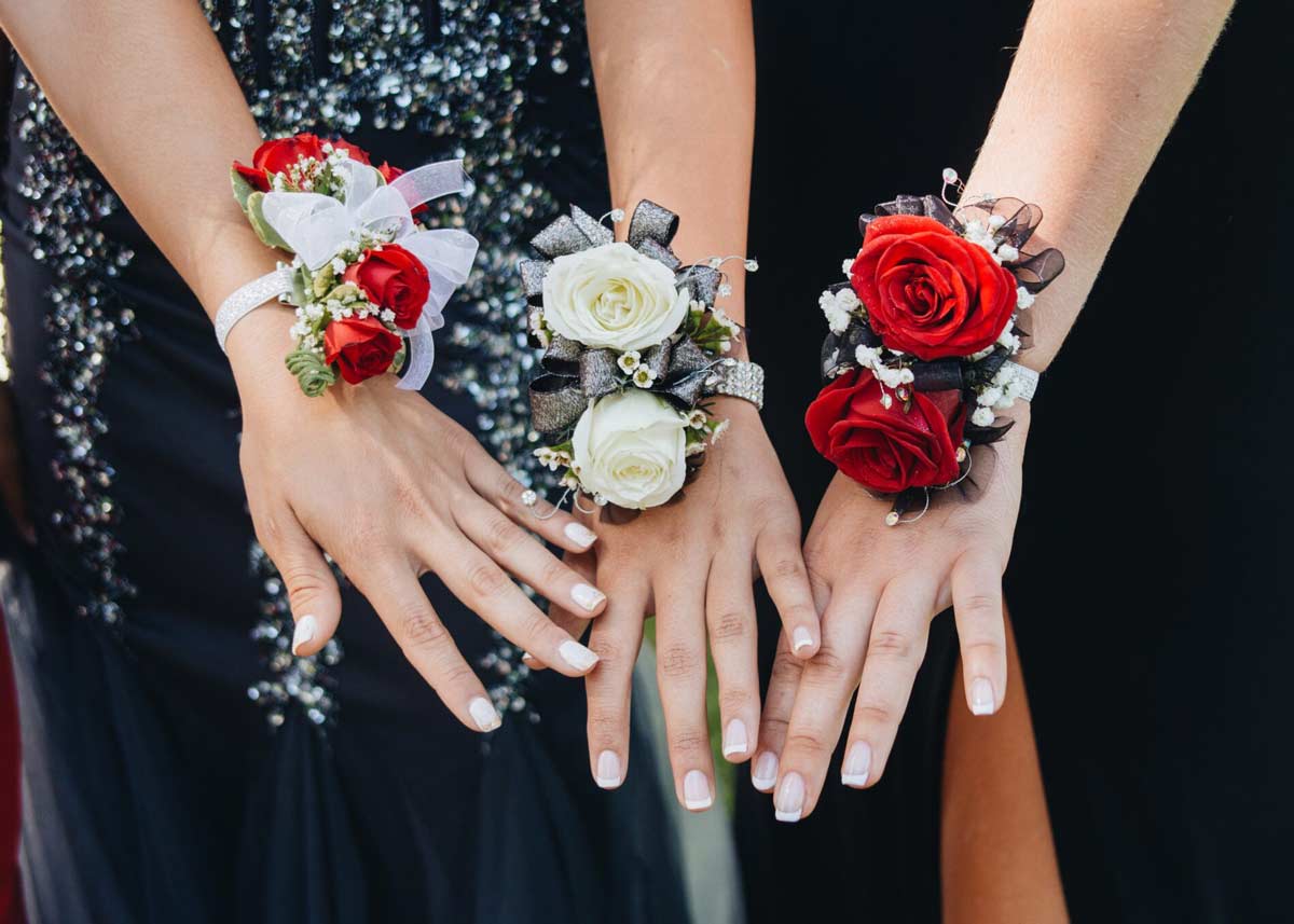 Three Hands with Wedding Flowers